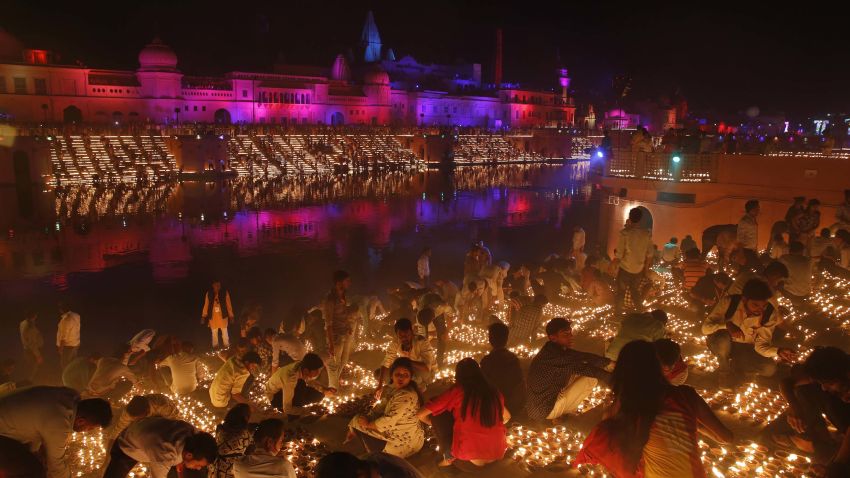 Devotees light earthen lamps on the banks of the River Sarayu as part of Diwali celebrations in Ayodhya, India, India, Tuesday, Nov. 6, 2018. The north Indian City of Ayodhya made an attempt to break the Guinness Book of World record when several earthen lamps were lit at the banks of river Saryu on the occasion of Diwali -- the festival of light. (AP Photo/Rajesh Kumar Singh)