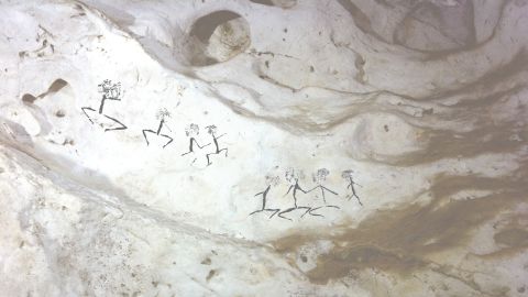 Human figures dated at least 13,600 years ago.