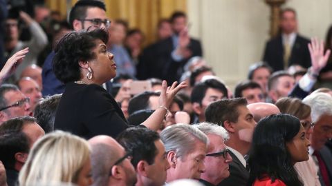 April Ryan asks questions during an exchange with Trump.