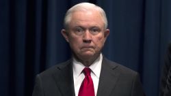 US Attorney General Jeff Sessions looks on during a press conference regarding the arrest of bombing suspect Cesar Sayoc in Florida, at the Department of Justice in Washington, DC on October 26, 2018. - The suspect has been charged with five federal crimes in connection with more than a dozen suspicious packages sent in a US mail bombing spree, Sessions said. (Photo by ANDREW CABALLERO-REYNOLDS / AFP)        (Photo credit should read ANDREW CABALLERO-REYNOLDS/AFP/Getty Images)