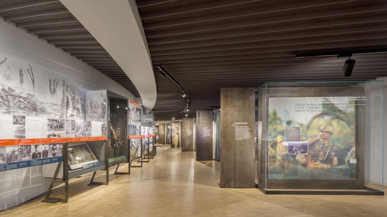 The history of the military is featured in a timeline installation that sits opposite interactive features.