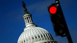 WASHINGTON, DC - SEPTEMBER 29:  A traffic light is seen in front of the United States Capitol building as Congress remains gridlocked over legislation to continue funding the federal government September 29, 2013 in Washington, DC. The House of Representatives passed a continuing resolution with language to defund U.S. President Barack Obama's national health care plan yesterday, but Senate Majority Leader Harry Reid has indicated the U.S. Senate will not consider the legislation as passed by the House.  (Photo by Win McNamee/Getty Images)