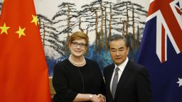 BEIJING, CHINA - NOVEMBER 08: Australian Foreign Minister Marise Payne and Chinese Foreign Minister Wang Yi shake hands at a news conference at the Diaoyutai State Guesthouse on November 8, 2018 in Beijing, China. (Photo by Thomas Peter-Pool/Getty Images)