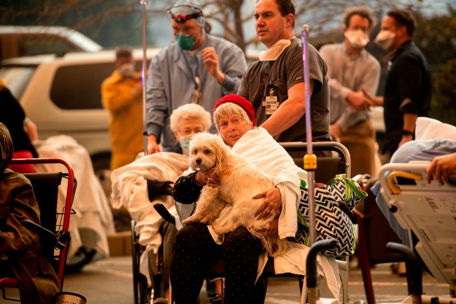 Medical personnel move patients as the Feather River Hospital is evacuated in Paradise on November 8.