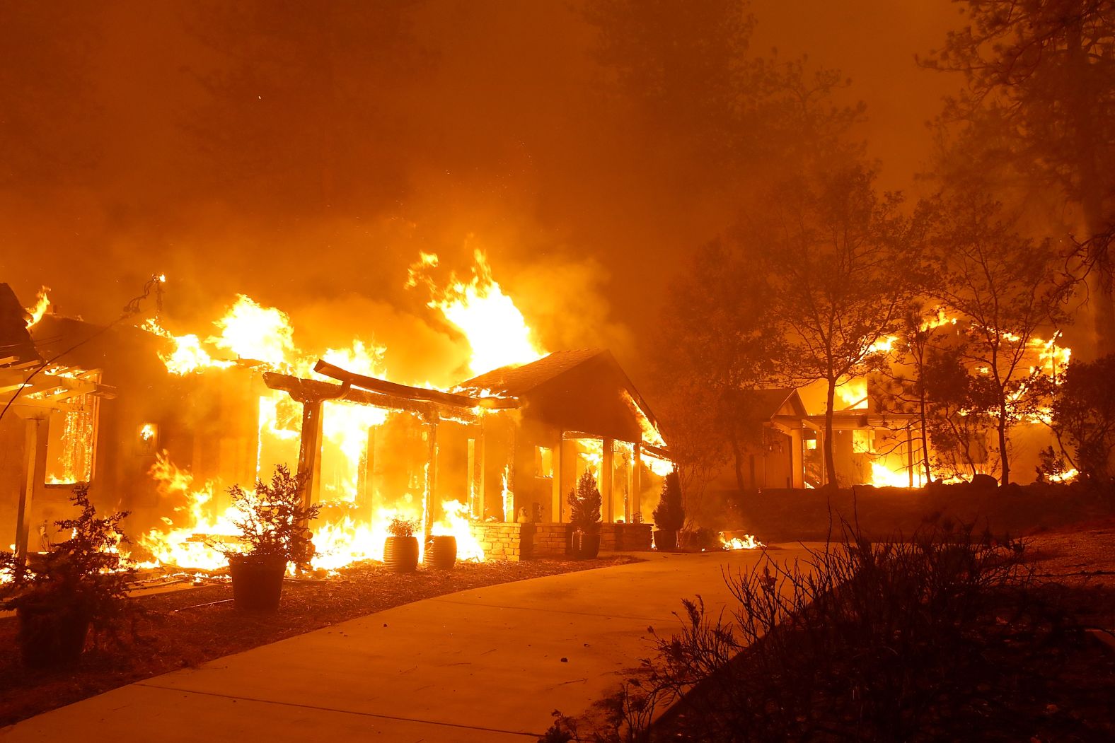 A Paradise home is engulfed in flames on November 8.