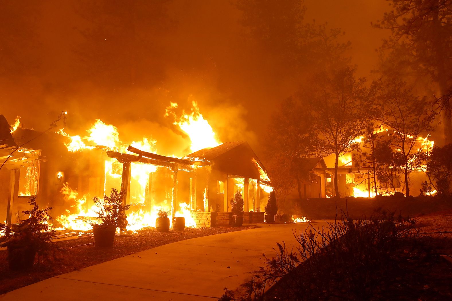 A Paradise home is engulfed in flames on November 8. 