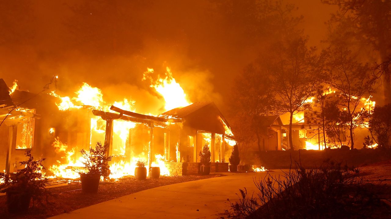 PARADISE, CA - NOVEMBER 08:  A home burns as the Camp Fire moves through the area on November 8, 2018 in Paradise, California. Fueled by high winds and low humidity, the rapidly spreading Camp Fire has ripped through the town of Paradise and has quickly charred 18,000 acres and has destroyed dozens of homes in a matter of hours. The fire is currently at zero containment.  (Photo by Justin Sullivan/Getty Images)