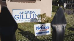 Campaign signs for Senator Bill Nelson, a Democrat from Florida, and Andrew Gillum, Democratic candidate for governor of Florida, stand near a home in Miami, Florida, U.S., on Monday, Nov. 5, 2018. Florida's turnout surpassed five million voters overnight, largely because of early voting in the Miami-Dade, Broward and Palm Beach counties. Photographer: Jayme Gershen/Bloomberg via Getty Images