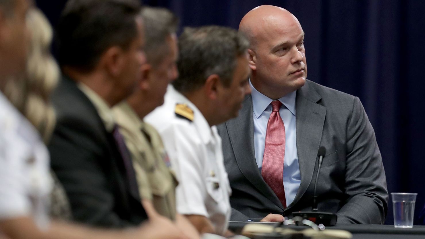 Department of Justice Chief of Staff Matt Whitaker (R) participates in a round table event with the Joint Interagency Task Force - South (JIATF-S) foreign liaison officers at the Department of Justice Kennedy building August 29, 2018 in Washington, DC.  (Photo by Chip Somodevilla/Getty Images)