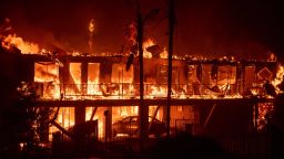 The Paradise Inn hotel burns as the Camp Fire tears through Paradise, North of Sacramento, California on November 08, 2018. - More than one hundred homes, a hospital, a Safeway store and scores of other structures have burned in the area and the fire shows no signs of slowing. (Photo by Josh Edelson / AFP)        (Photo credit should read JOSH EDELSON/AFP/Getty Images)