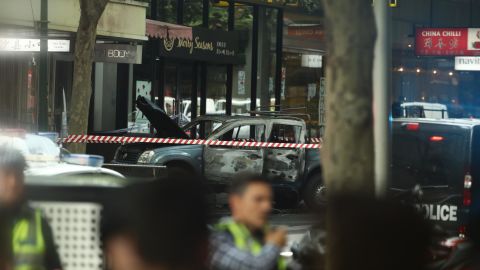 The attacker's pick up truck burnt out as he lunged people with a knife.