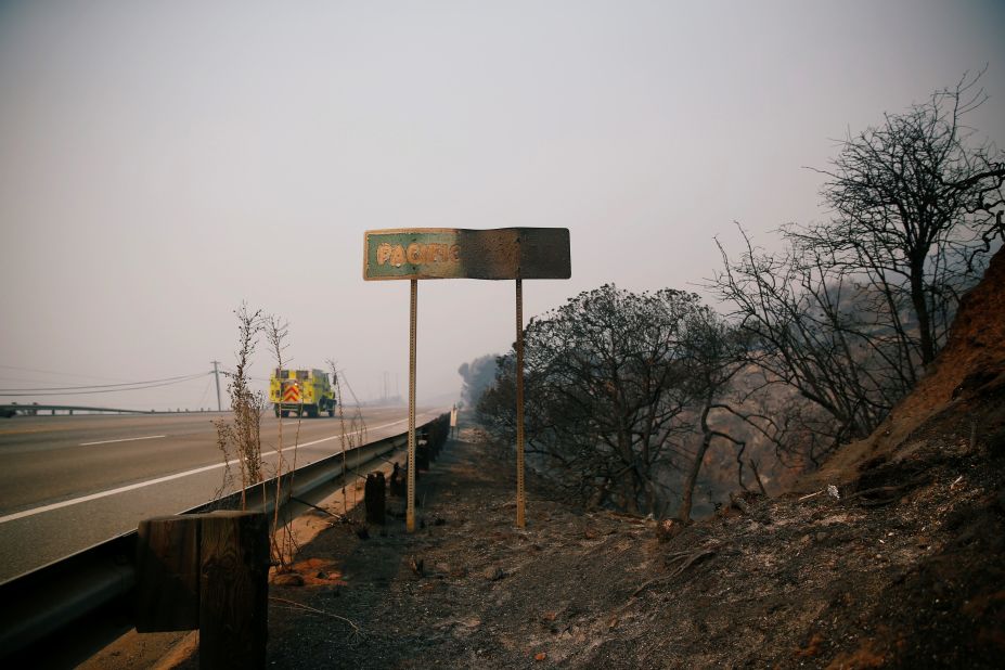 A fire truck is seen on the Pacific Coast Highway as the Woolsey Fire burns in Malibu on November 10.