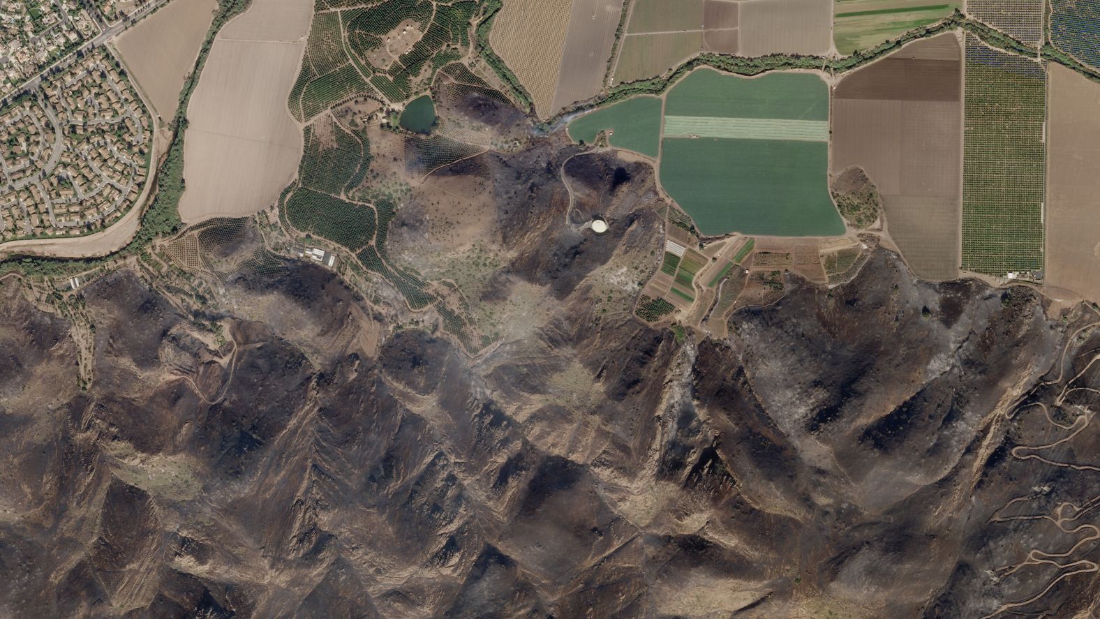 A satellite image from November 10 shows vegetation that was burned as a result of the Woolsey Fire.