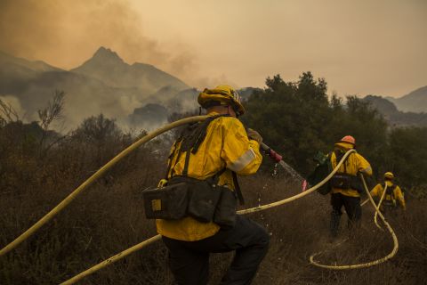 Los Angeles County firefighters work in Malibu Creek State Park on November 10.