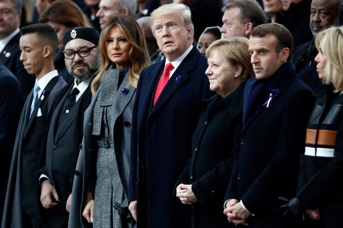 Moroccan King Mohammed VI, US first lady Melania Trump, US President Donald Trump, German Chancellor Angela Merkel, French President Emmanuel Macron and his wife Brigitte attend a ceremony at the Arc de Triomphe in Paris.