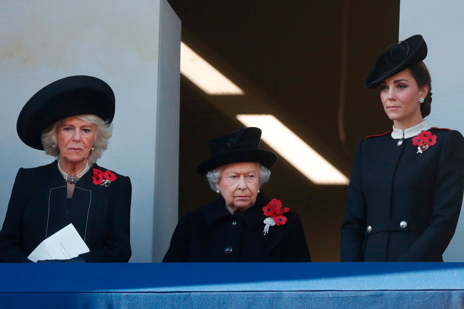Britain's Queen Elizabeth II, center, Camilla, Duchess of Cornwall, and Kate, Duchess of Cambridge, right, attend the Remembrance Sunday ceremony at the Cenotaph in London. Remembrance Sunday each year commemorates veterans of military conflicts. 