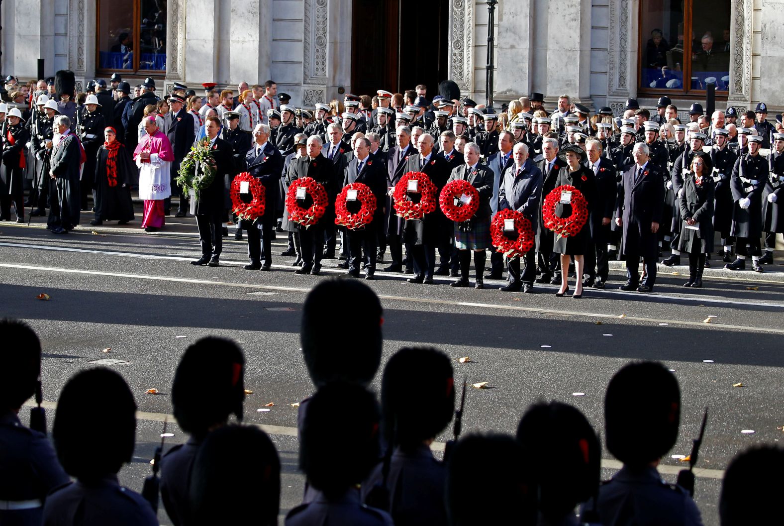 British Prime Minister Theresa May, other political leaders and ex-Prime Ministers stand in silence on Whitehall during a National Service of Remembrance at The Cenotaph in Westminster, London on Sunday.