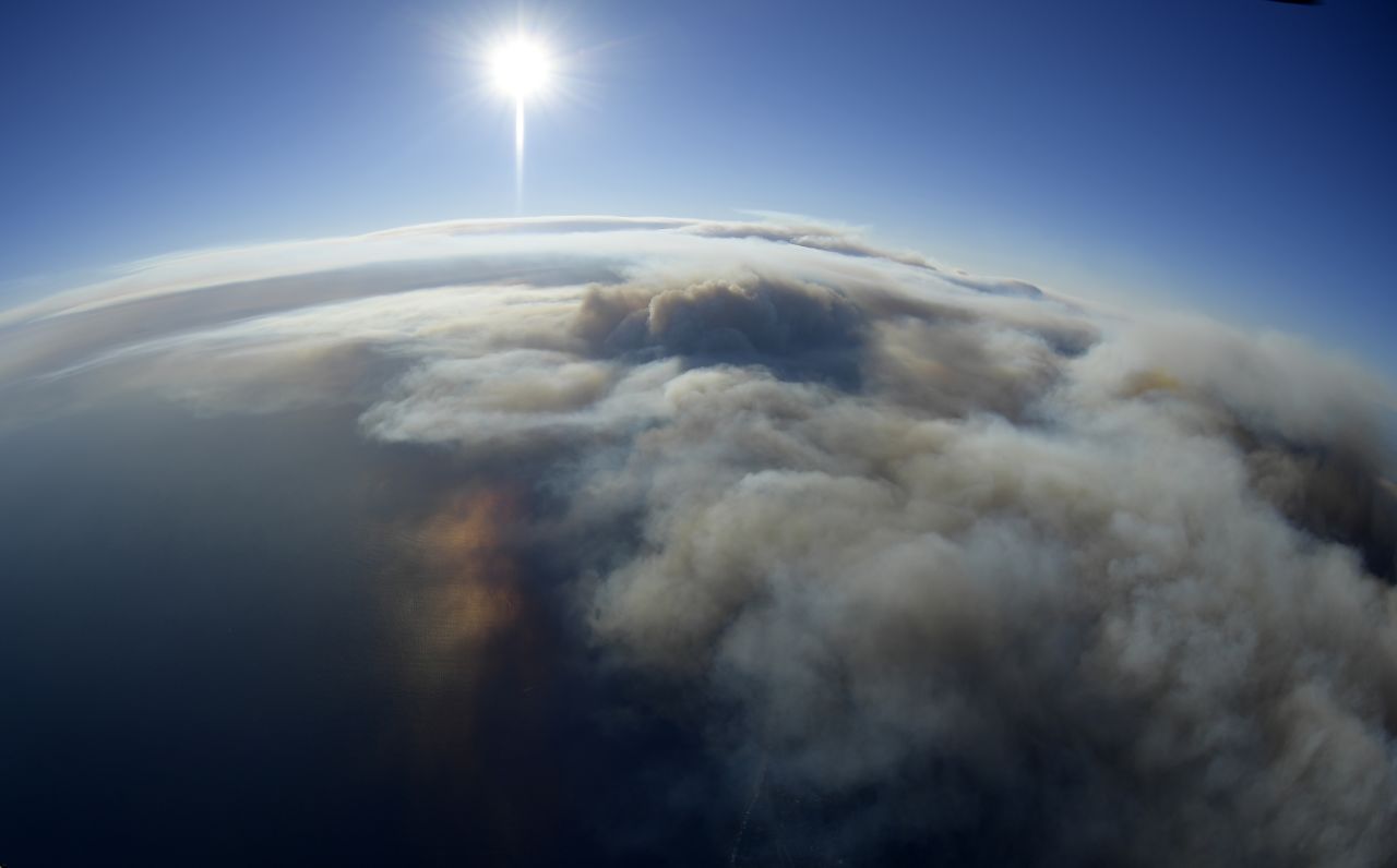 Smoke is seen over the Pacific in this photo taken from a helicopter over Malibu on November 9.