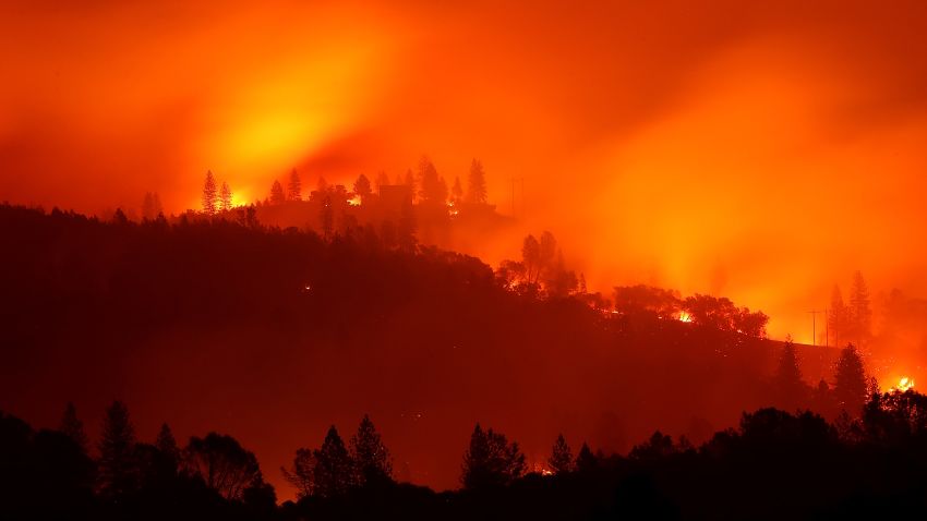BIG BEND, CA - NOVEMBER 10:  The Camp Fire burns in the hills on November 10, 2018 near Big Bend, California. Fueled by high winds and low humidity the Camp Fire ripped through the town of Paradise charring 105,000 acres, killed 23 people and has destroyed over 6,700 homes and businesses. The fire is currently at 20 percent containment.  (Photo by Justin Sullivan/Getty Images)
