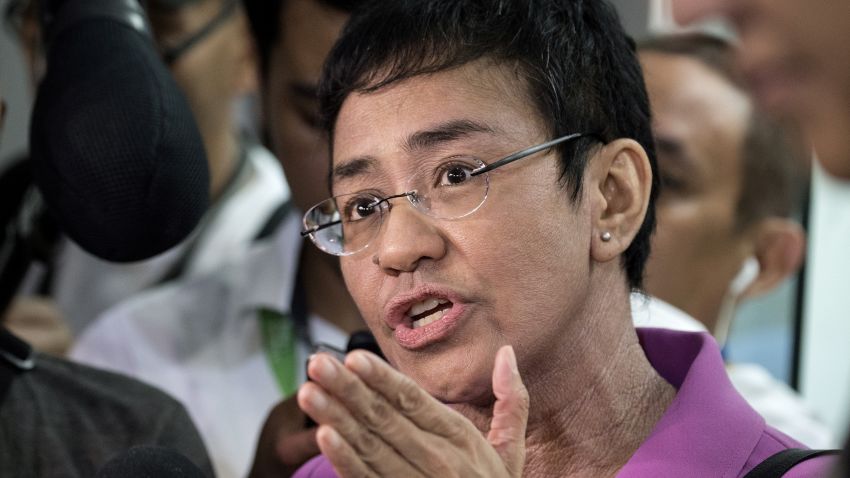 CEO of Philippine news website Rappler, Maria Ressa, gestures as she speaks to the media as she arrives at the National Bureau of Investigation (NBI) headquarters in Manila on January 22, 2018. The head of a news website threatened with closure by the government appeared before state investigators on January 22 over a defamation complaint which she decried as part of President Rodrigo Duterte's concerted attack on press freedom. / AFP PHOTO / NOEL CELIS        (Photo credit should read NOEL CELIS/AFP/Getty Images)
