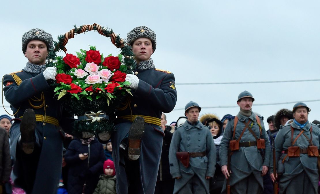 Russian honour guards carry wreaths marking the centenary of the Armistice Day at the Brotherly cemetery of WWI heroes in Tsarskoye Selo outside Saint Petersburg.