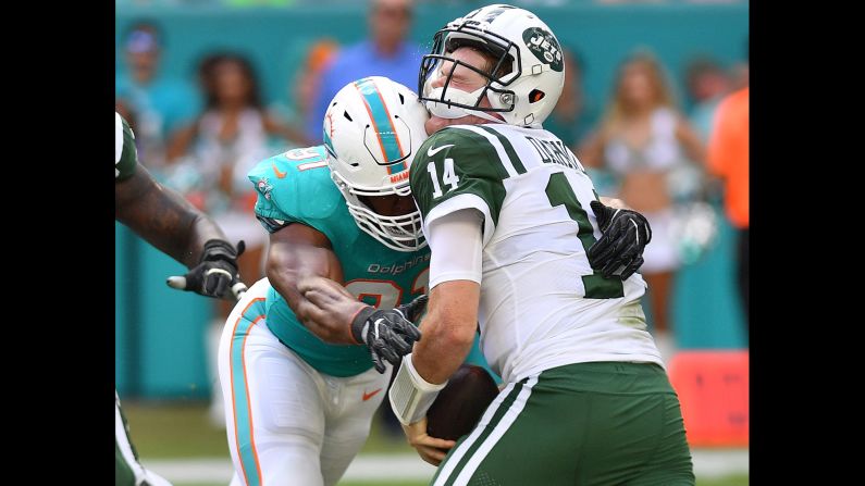 Cameron Wake of the Miami Dolphins sacks New York Jets quarterback Sam Darnold in the second quarter of their game on November 4 in Miami, Florida. The rookie QB suffered a sprained right foot in the 13-6 loss and subsequently missed Sunday's game against the Bills.