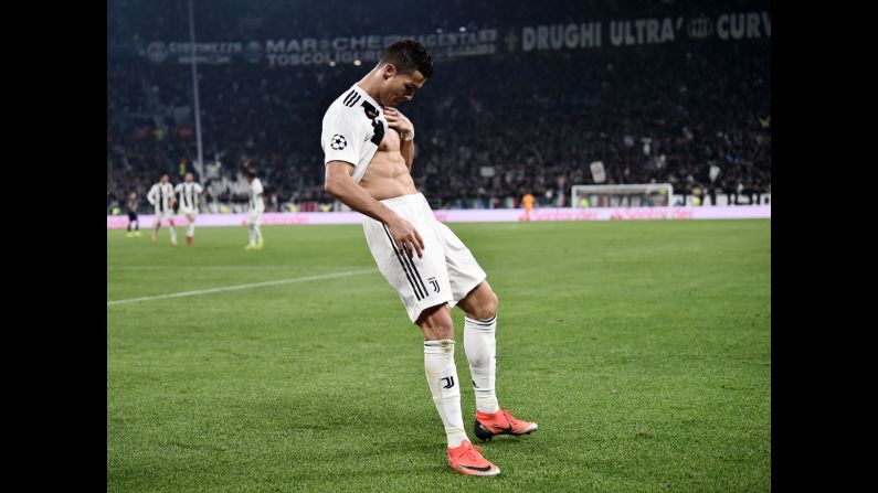 Cristiano Ronaldo shows off his six-pack in celebration after scoring the opening goal of a Champions League match between Juventus and Manchester United on November 7. Manchester United, one of Ronaldo's former teams, <a href="index.php?page=&url=https%3A%2F%2Fedition.cnn.com%2F2018%2F11%2F07%2Ffootball%2Fjuventus-man-utd-champions-league%2Findex.html" target="_blank">came back to win the match 2-1. </a>