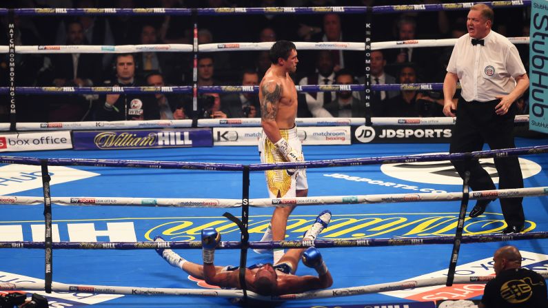 Oleksandr Usyk of Ukraine knocks out Tony Bellew of England during the WBC, WBA, WBO and IBF cruiserweight title fight at Manchester Arena on November 10 in Manchester, England.