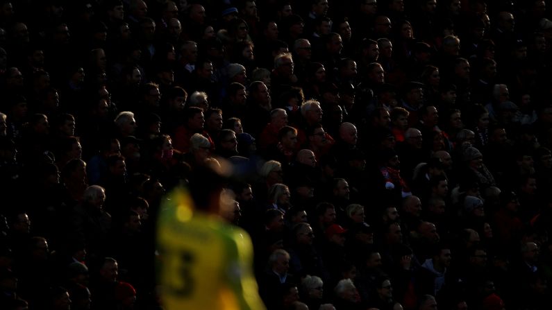 Fans look on during a match between Liverpool and Fulham on November 11 in Anfield, Liverpool, England.