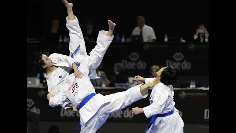 Japan's Saori Ishibashi, Mai Mugiyama and Sae Taira compete in the Kata team female final during the 24th Karate World Championships on November 11, in Madrid.
