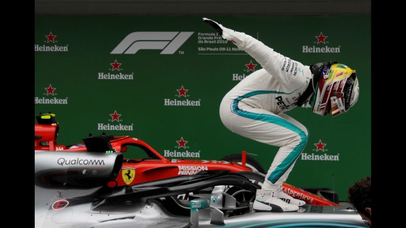 Mercedes' Lewis Hamilton celebrates after winning the Formula One Brazilian Grand Prix in Sao Paulo, Brazil on November 11. Earlier this year, Hamilton captured his fifth F1 world title, a milestone previously reached by only two other drivers in the history of the sport.