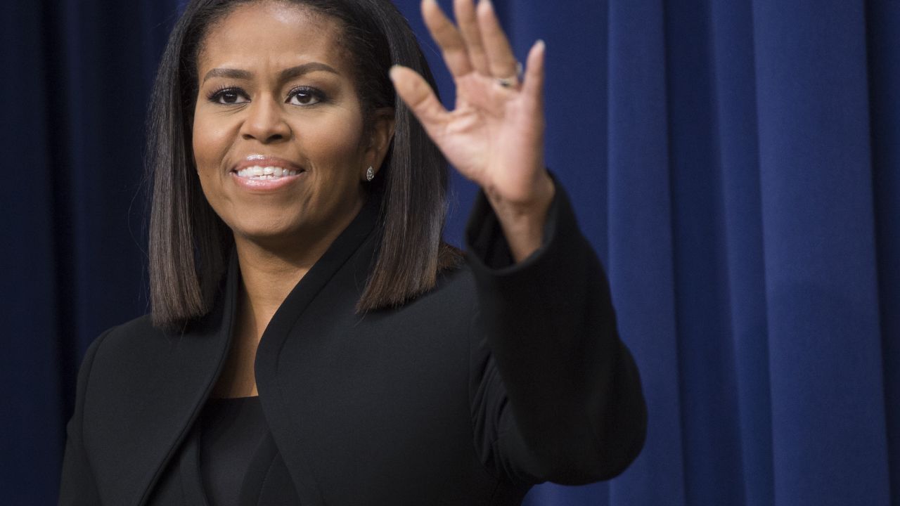 US First Lady Michelle Obama speaks following a screening of the movie, "Hidden Figures," in the Eisenhower Executive Office Building adjacent to the White House in Washington, DC, December 15, 2016. / AFP / SAUL LOEB (Photo credit should read SAUL LOEB/AFP/Getty Images)