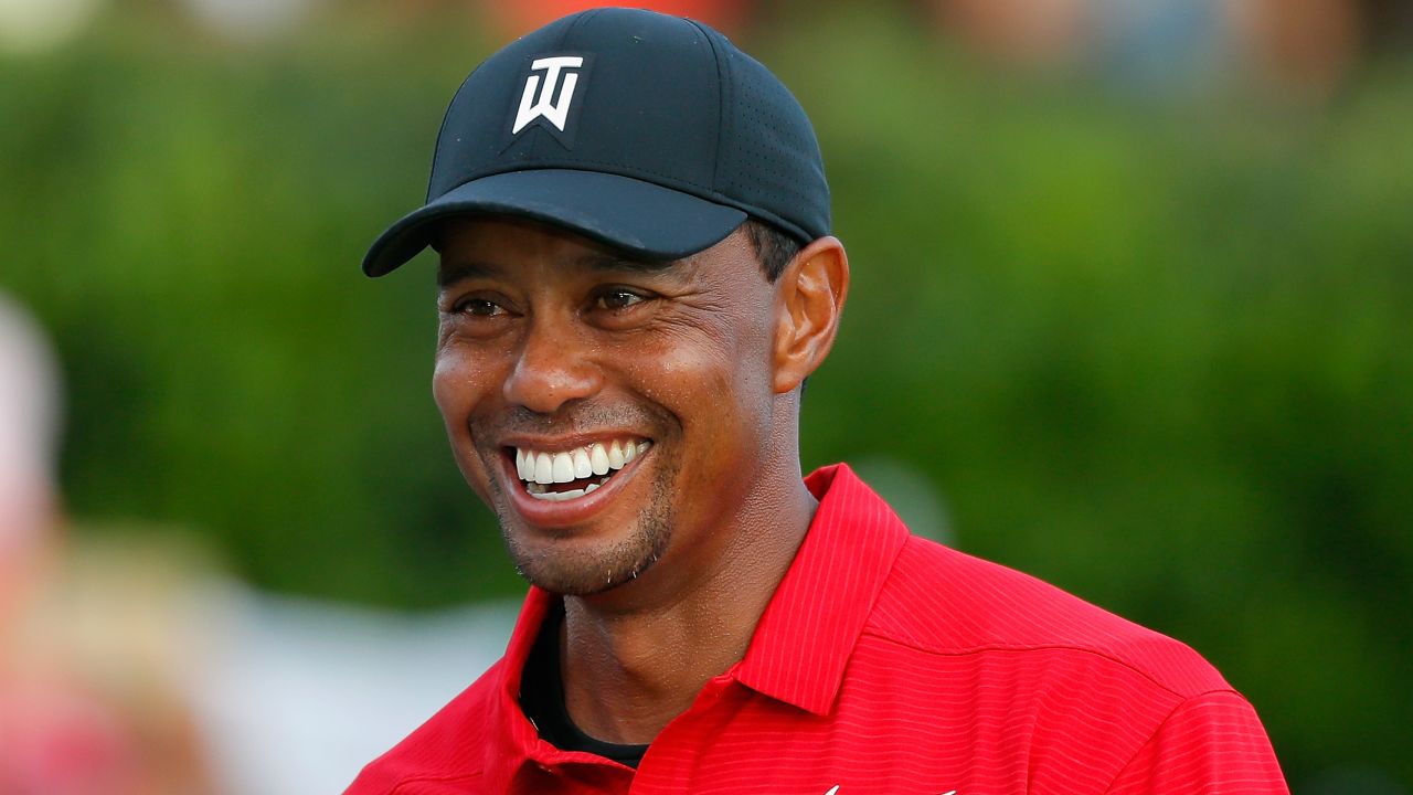ATLANTA, GA - SEPTEMBER 23: Tiger Woods of the United States reacts during the trophy presentation ceremony after winning the TOUR Championship at East Lake Golf Club on September 23, 2018 in Atlanta, Georgia. (Photo by Kevin C. Cox/Getty Images)