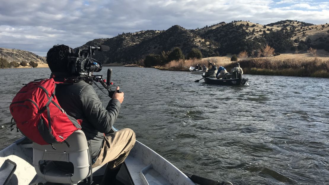 CNN producer Jeremy Harlan filming in the rivers near Bozeman, Montana.