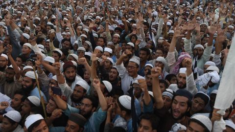 Supporters of the Pakistani religious Islamist group Mutahida Majlis-e-Amal (MMA) gather during a protest rally against the release of Asia Bib in early November.