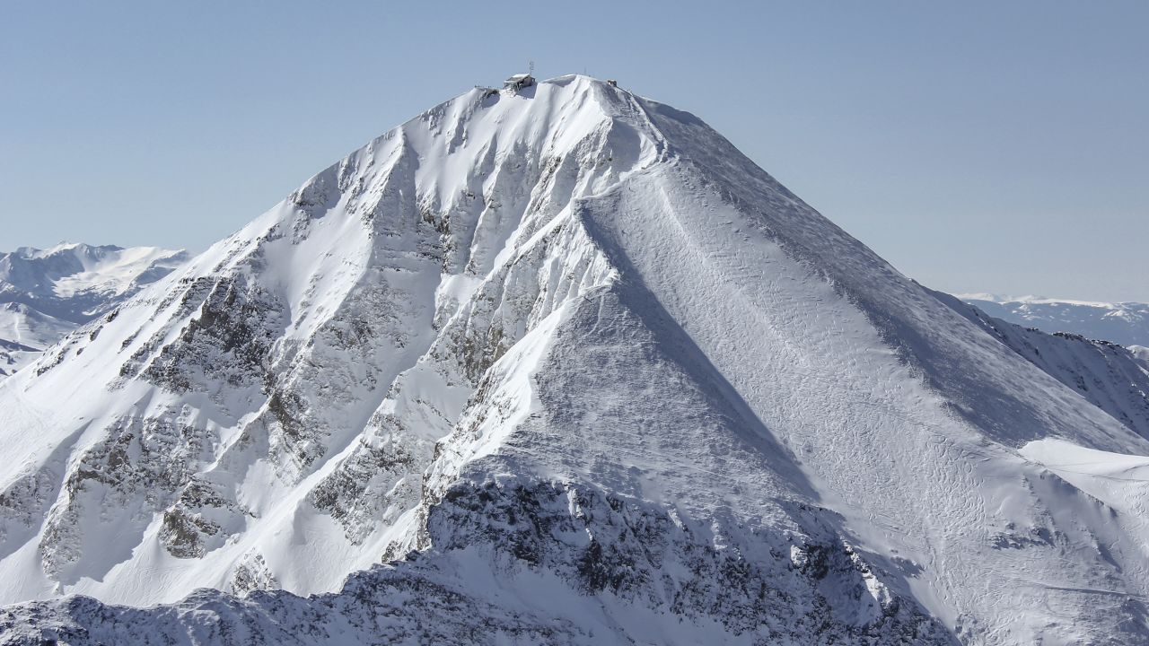 A view of the summit of Lone Peak, a 11,166-foot peak at Montana's Big Sky Resort. Only a limited number of skiers can ski off the peak at one time.