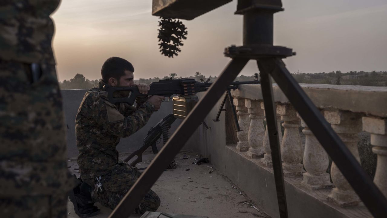 YPG fighters are seen on the frontline on October 18, in Baghoz, Syria, during the Hajin operation to retake the last stronghold of ISIS in Syria.