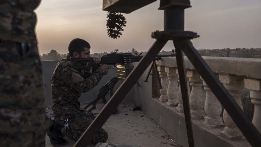 YPG fighters are seen on the frontline on October 18, in Baghoz, Syria, during the Hajin operation to retake the last stronghold of ISIS in Syria.