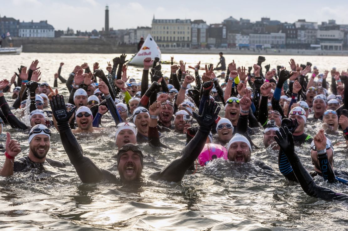 Edgley was joined by 300 swimmers for the final mile of his epic around-Britain swim. 