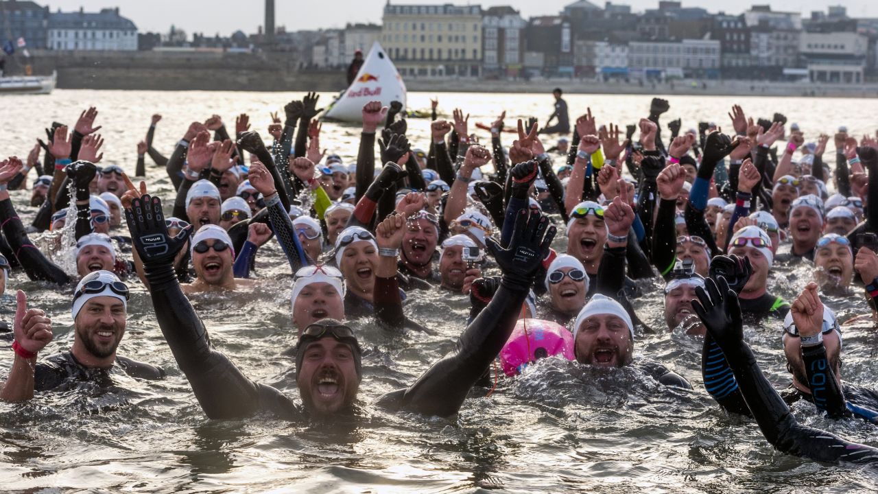 Edgley was joined by 300 swimmers for the final mile of his epic around-Britain swim.