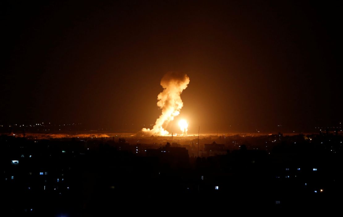 Smoke and flame are seen during an Israeli airstrike in Gaza.