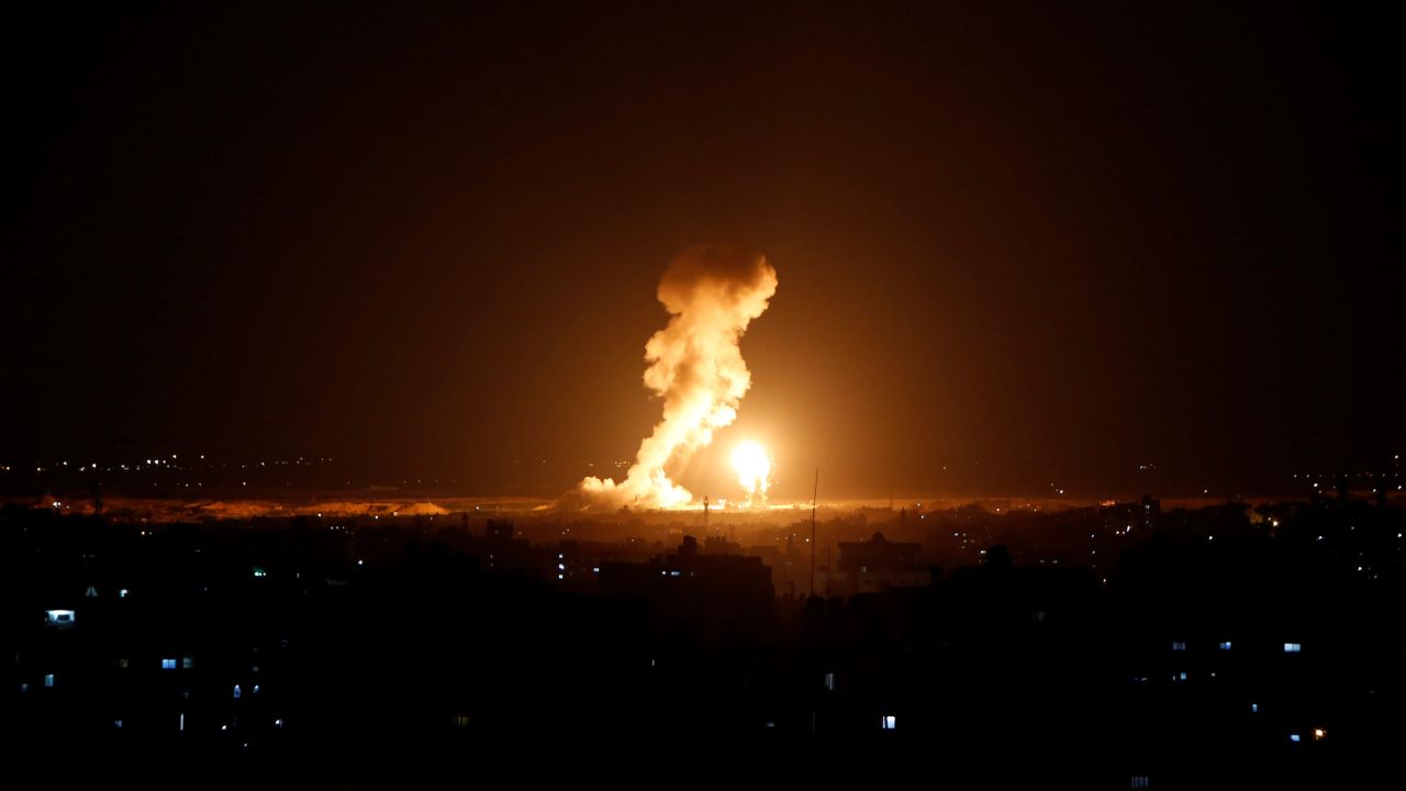 Smoke and flame are seen during an Israeli airstrike in Gaza.