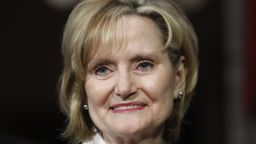 Mississippi Republican Cindy Hyde-Smith smiles during her ceremonial swearing-in at the Old Senate Chamber, Monday, April 9, 2018, in the Capitol in Washington. She was appointed by Mississippi Gov. Phil Bryant to succeed Sen. Thad Cochran, R-Miss., who resigned April 1 for health reasons. 
