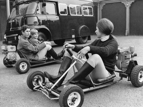 Prince Charles, left, rides go-carts with his brother Prince Edward and his sister, Princess Anne, circa 1969.