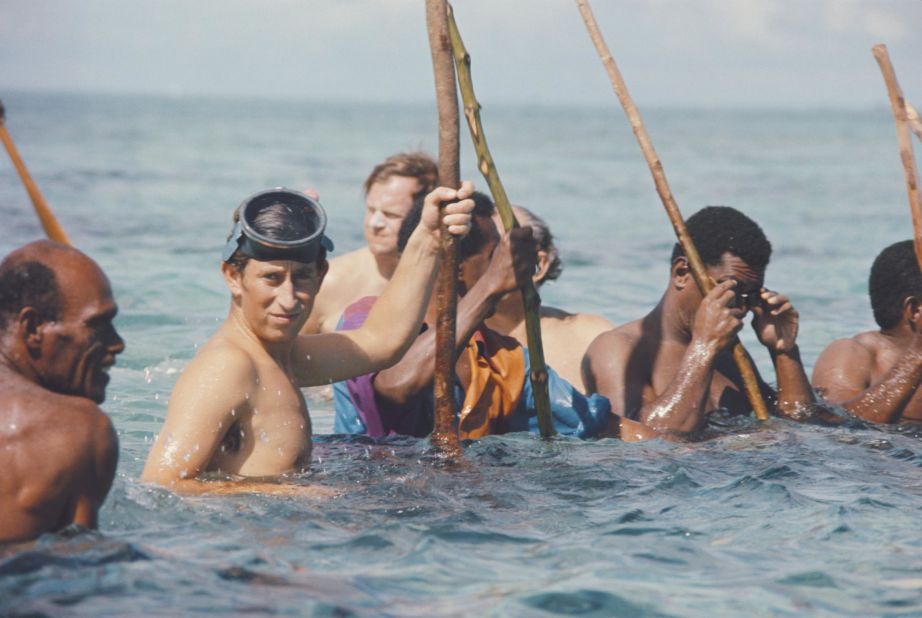 Charles fishes with a wooden spear circa 1975.