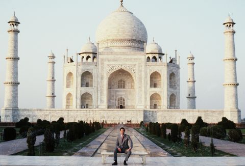 Charles poses outside the Taj Mahal in India in 1980.