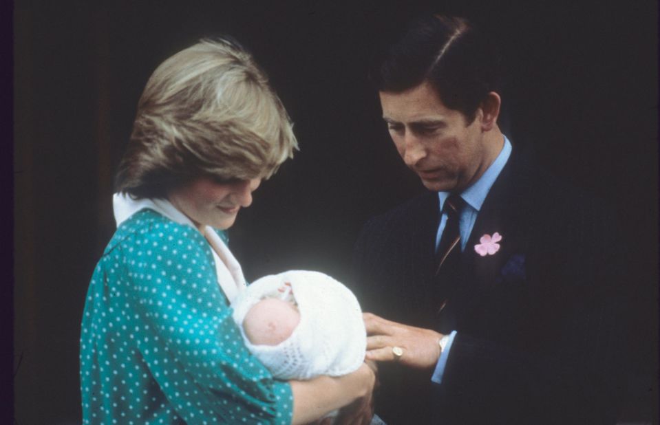 Charles and Princess Diana leave a London hospital with their first child, William, in July 1982.
