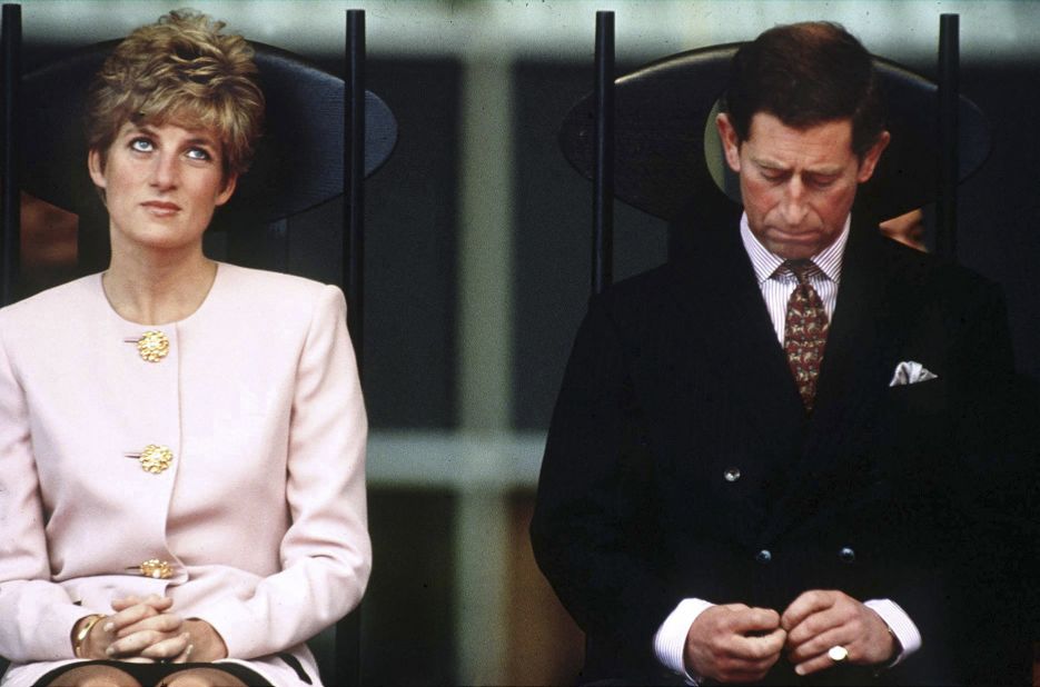 Charles and Diana sit together in Toronto during a royal tour in October 1991. A year later, they were separated. Charles' affair with Camilla Parker Bowles became public in 1993.