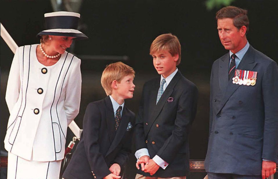 Charles, Diana and their two sons, William and Harry, gather for V-J Day commemorations in London in August 1995. The couple divorced one year later.