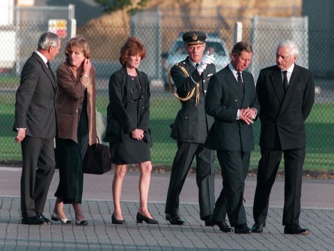 Charles, second from right, and Princess Diana's two sisters meet in Paris after Diana was killed in a car crash there in August 1997. She was 36 years old.
